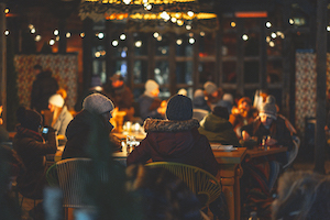 A shot of people in a restaurant at Christmas Market
