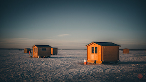 log cabin on the frozen Lake Simcoe